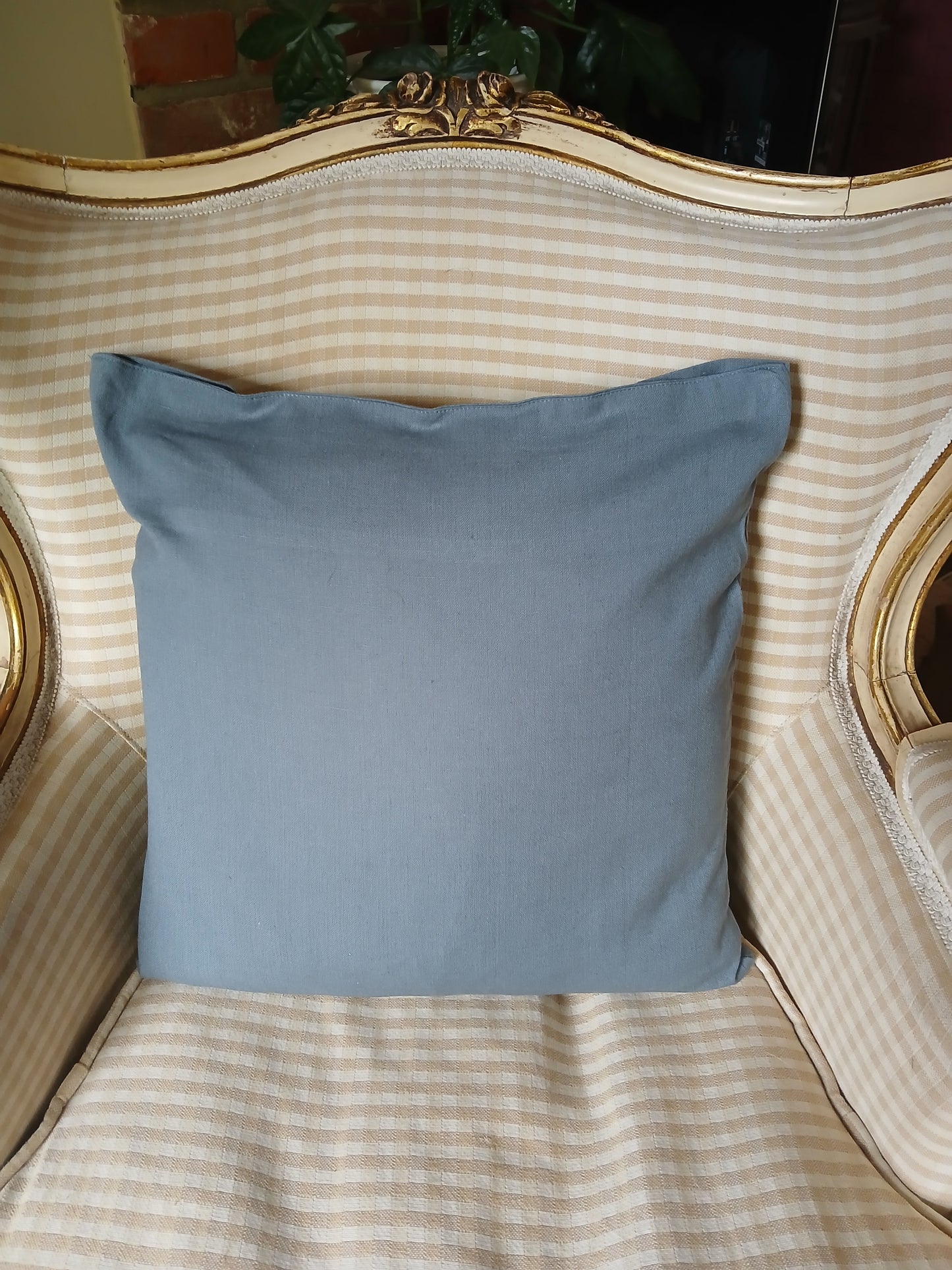 Seeds in White on dusky blue/grey cushion cover with buttons