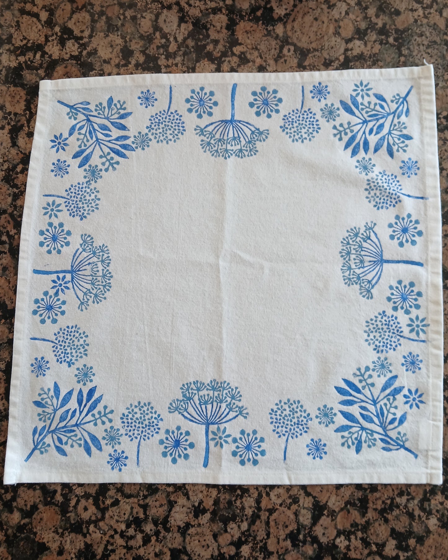 Seeds in Blue on white cotton napkin