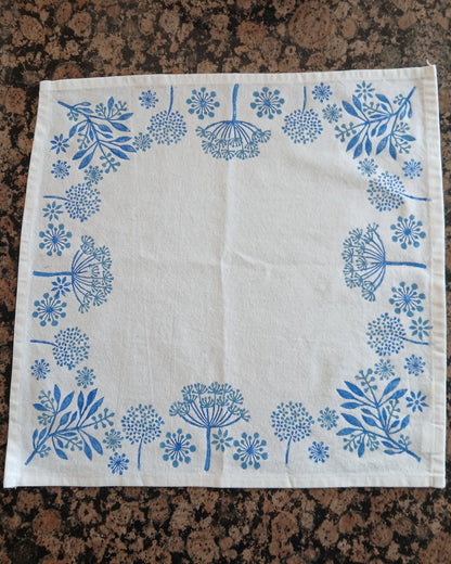 Seeds in Blue on white cotton napkin