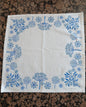 Seeds in Blue on white cotton napkin
