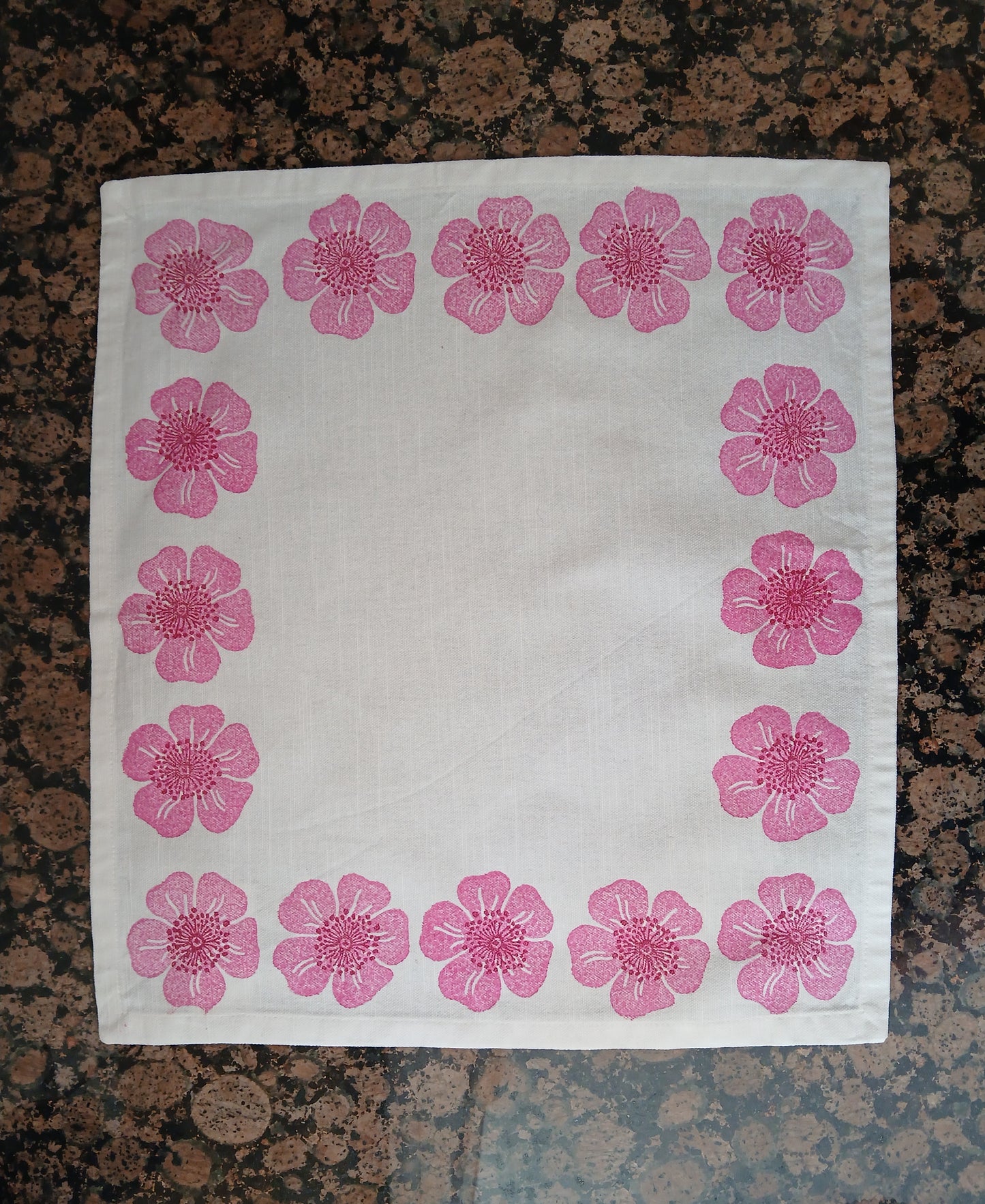 Dog Roses in Pink & Raspberry on white cotton napkin