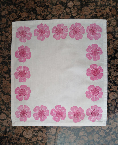 Dog Roses in Pink & Raspberry on white cotton napkin