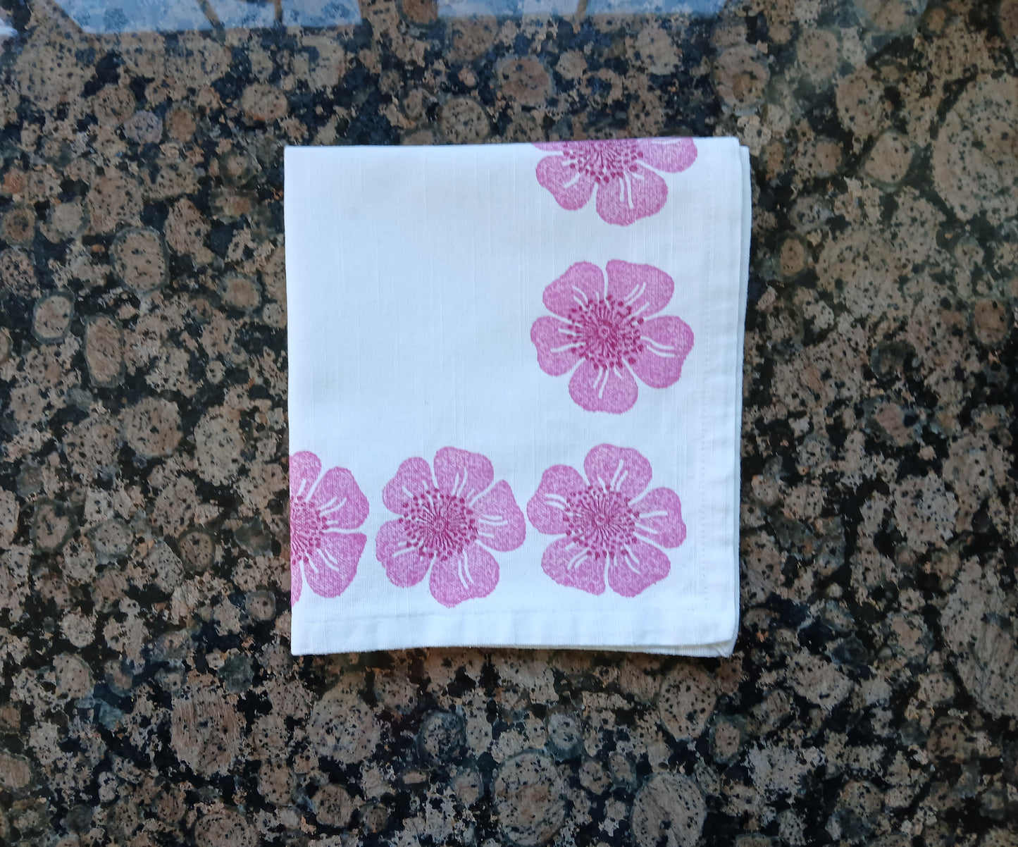 Dog Roses in Pink & Raspberry on white cotton napkin