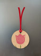 Tulip in Raspberry on round brown gift tag with ribbon