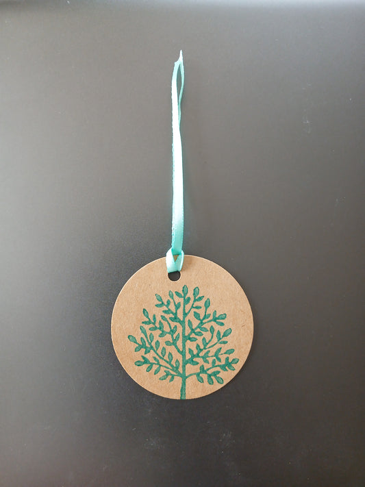 Indian Tree in Teal on round brown gift tag with ribbon
