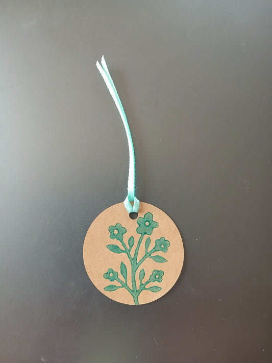 Flower Bunch in Teal on round brown gift tag with ribbon