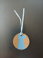 Bunny in Blue on round brown gift tag with ribbon
