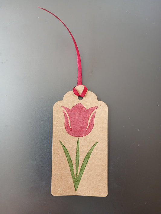 Tulip in Raspberry & Green on oblong brown gift tag with ribbon
