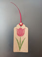 Tulip in Raspberry & Green on oblong brown gift tag with ribbon