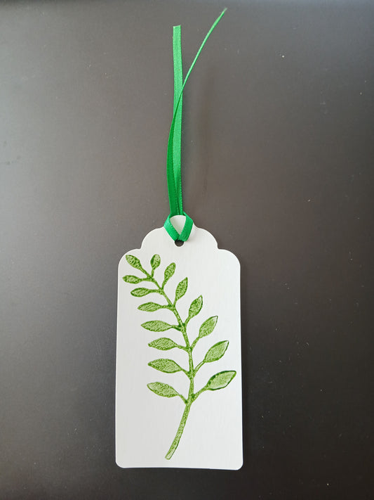 Indian Curved Leaf in Green on oblong white gift tag with ribbon