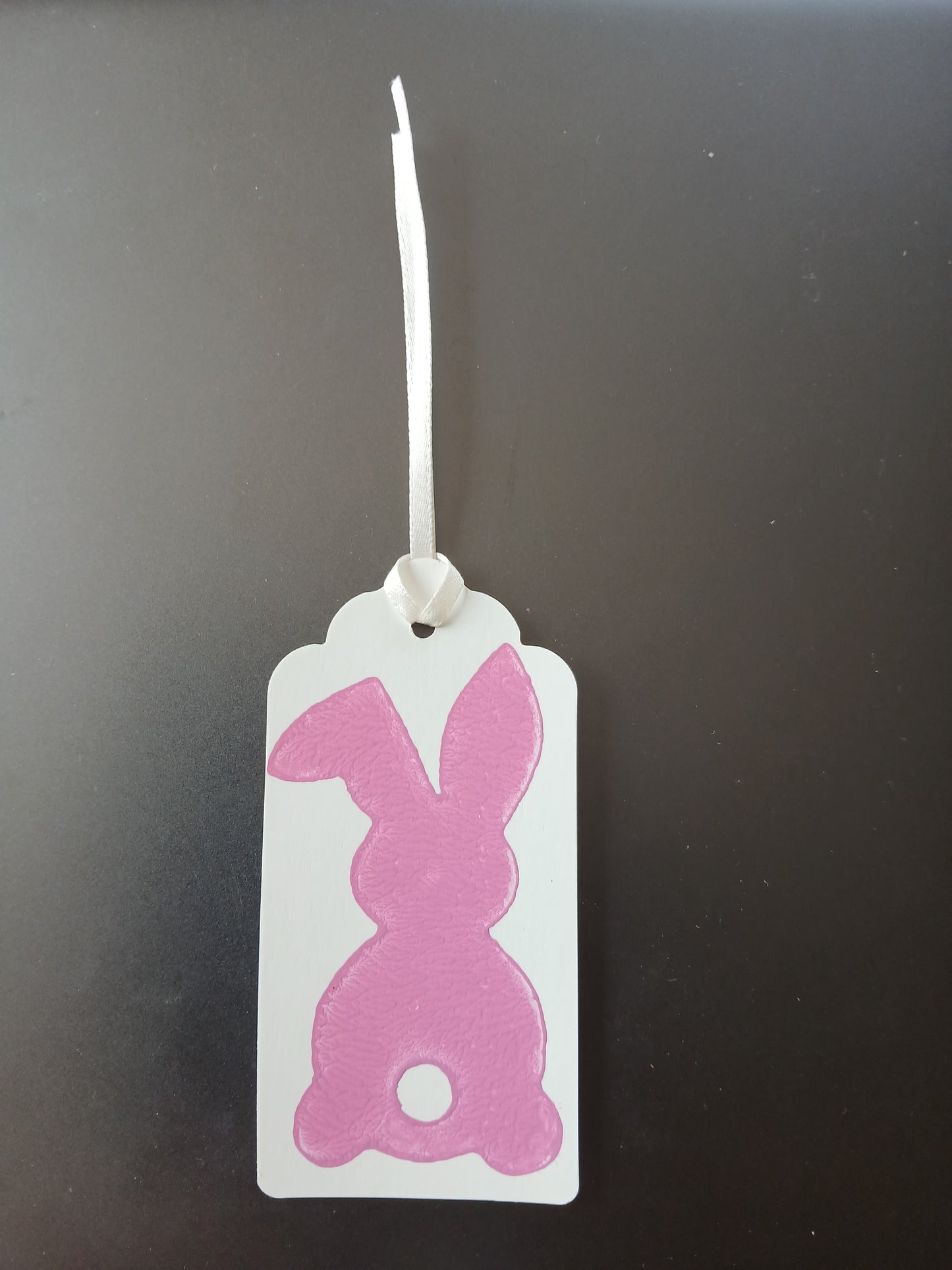 Bunny (large) in Pink on oblong white gift tag with ribbon