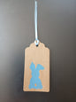 Bunny (small) in Blue on oblong brown gift tag with ribbon
