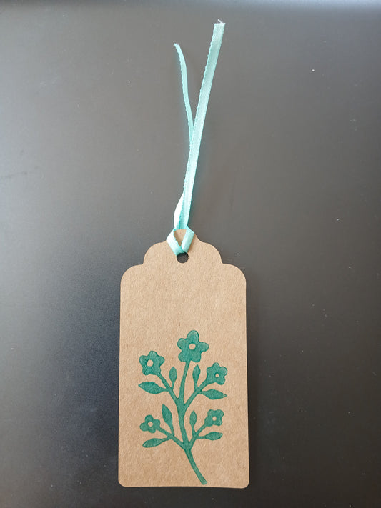 Flower Bunch in Teal on oblong brown gift tag with ribbon