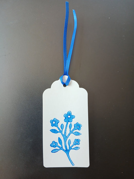 Flower Bunch in Brilliant Blue on oblong white gift tag with ribbon