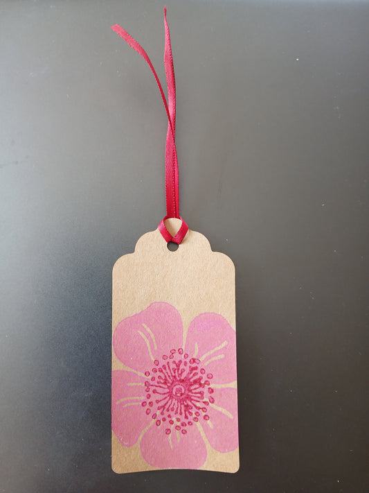 Dog Rose in Pink & Raspberry on oblong brown gift tag with ribbon