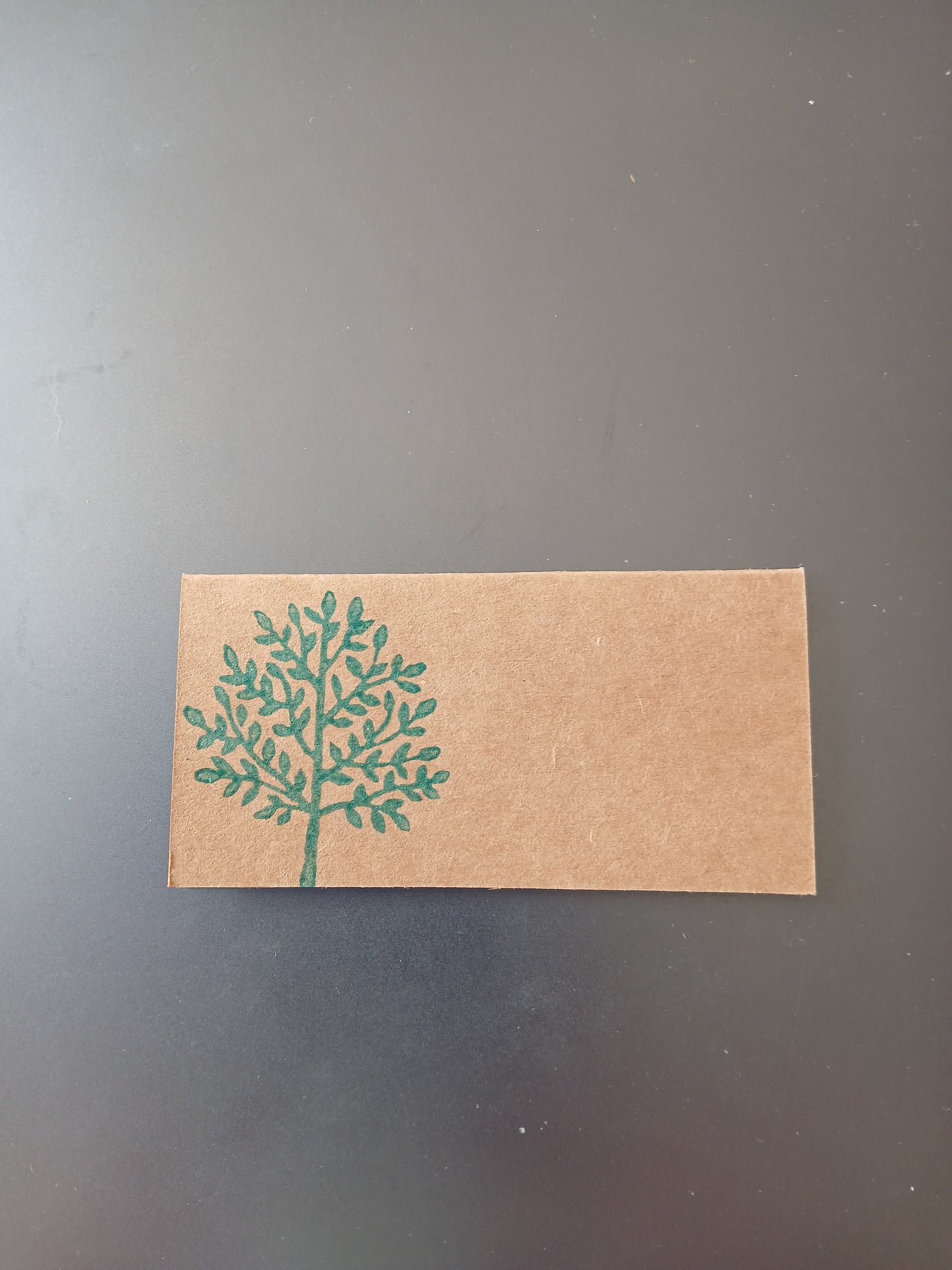 Indian Tree in Teal on rectangle brown place card