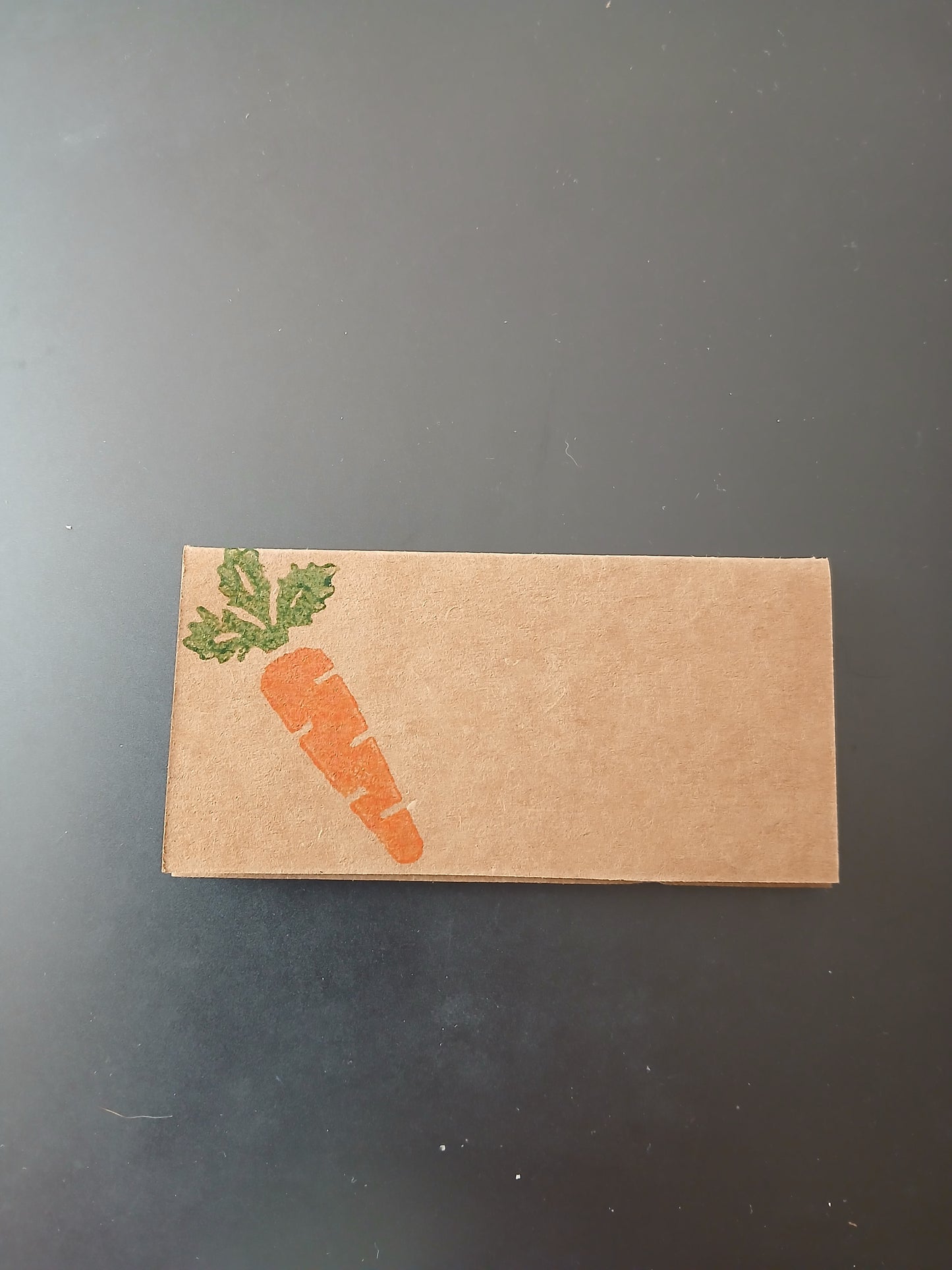 Carrot in Orange & Green on rectangle brown place card