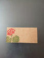 Geranium in Red & Green on rectangle brown place card
