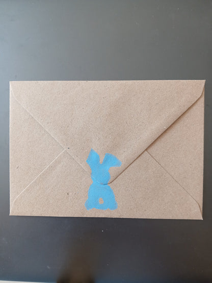 Bunny in Blue on brown notelet