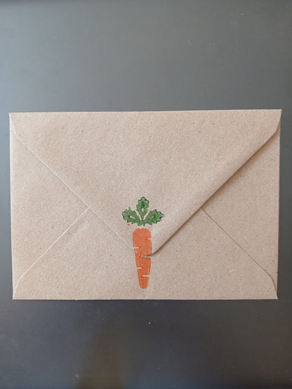 Carrot in Orange & Green on brown notelet