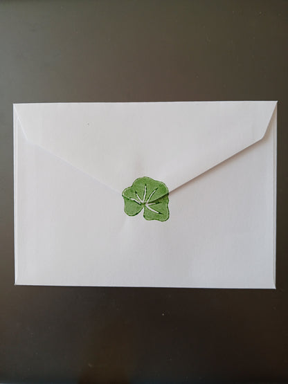 Geranium in Red & Green on white notelet