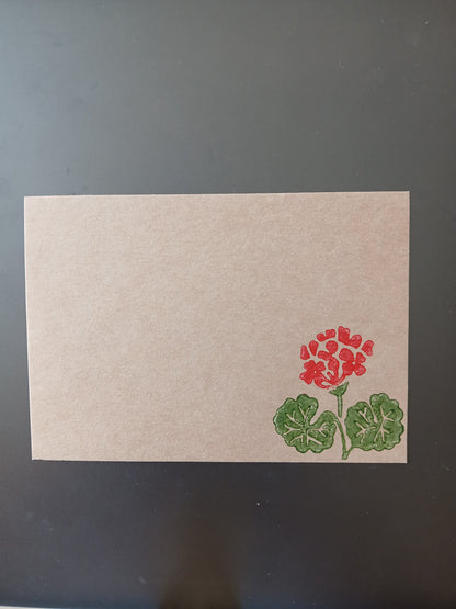 Geranium in Red & Green on brown notelet
