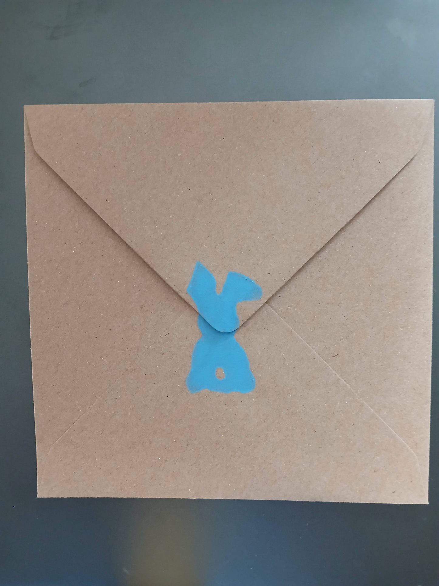 Bunny & Tulip with floral border in Blue & Green on brown card