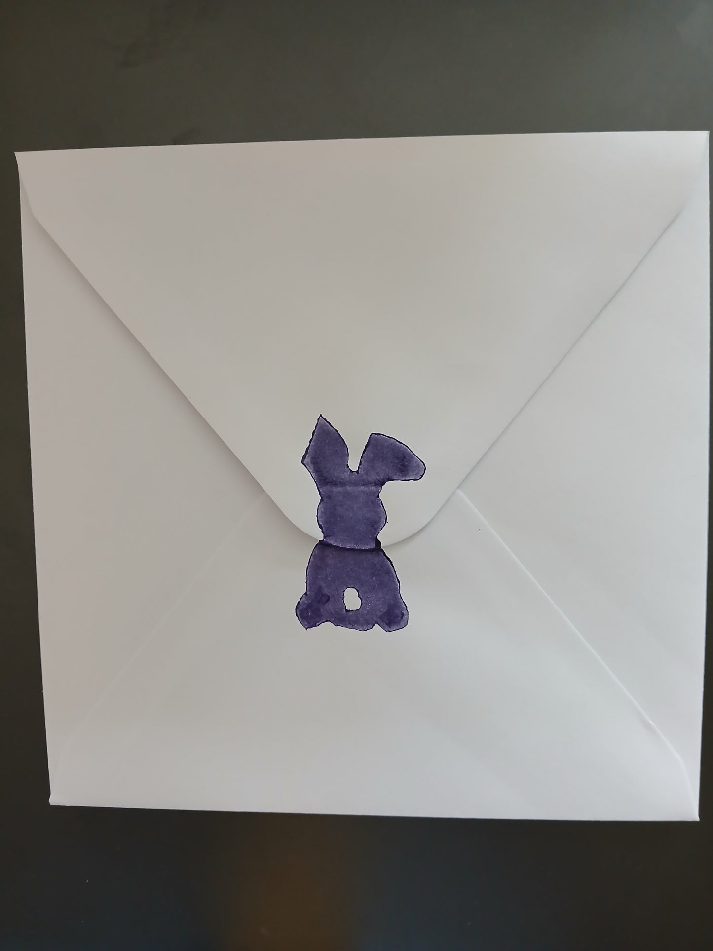 Bunny & Carrot with floral border in Purple, Orange & Green on white card