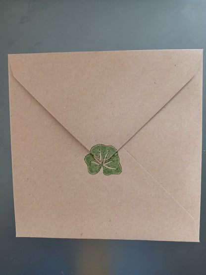 Geraniums in Red, Green & Brown on brown card