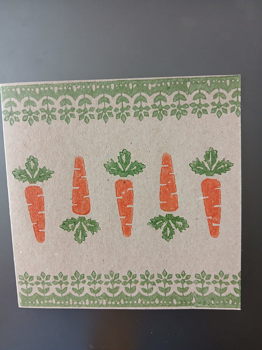Carrots with floral border in Orange & Green on brown card
