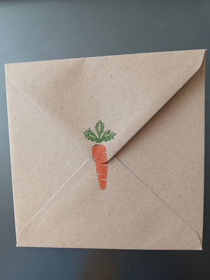 Carrots with floral border in Orange & Green on brown card