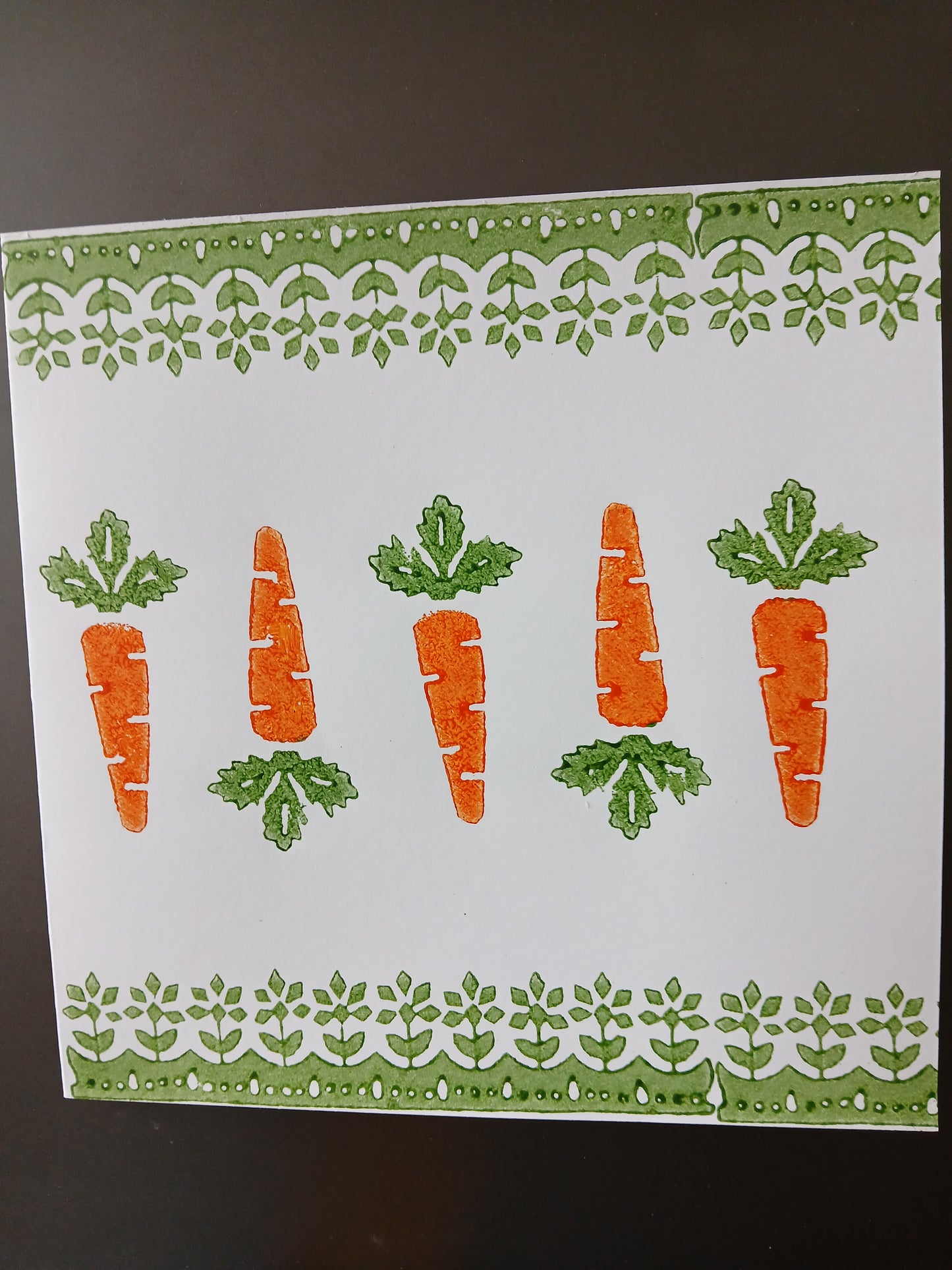 Carrots with floral border in Orange & Green on white card