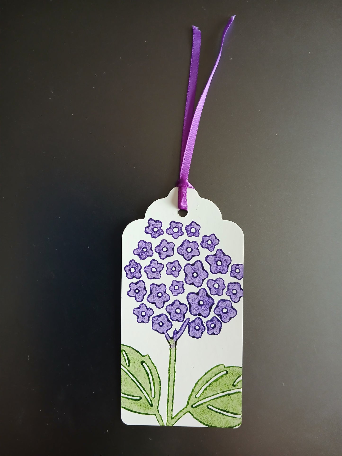 Hydrangea in Puple & Green on oblong white gift tag with ribbon