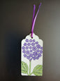 Hydrangea in Puple & Green on oblong white gift tag with ribbon