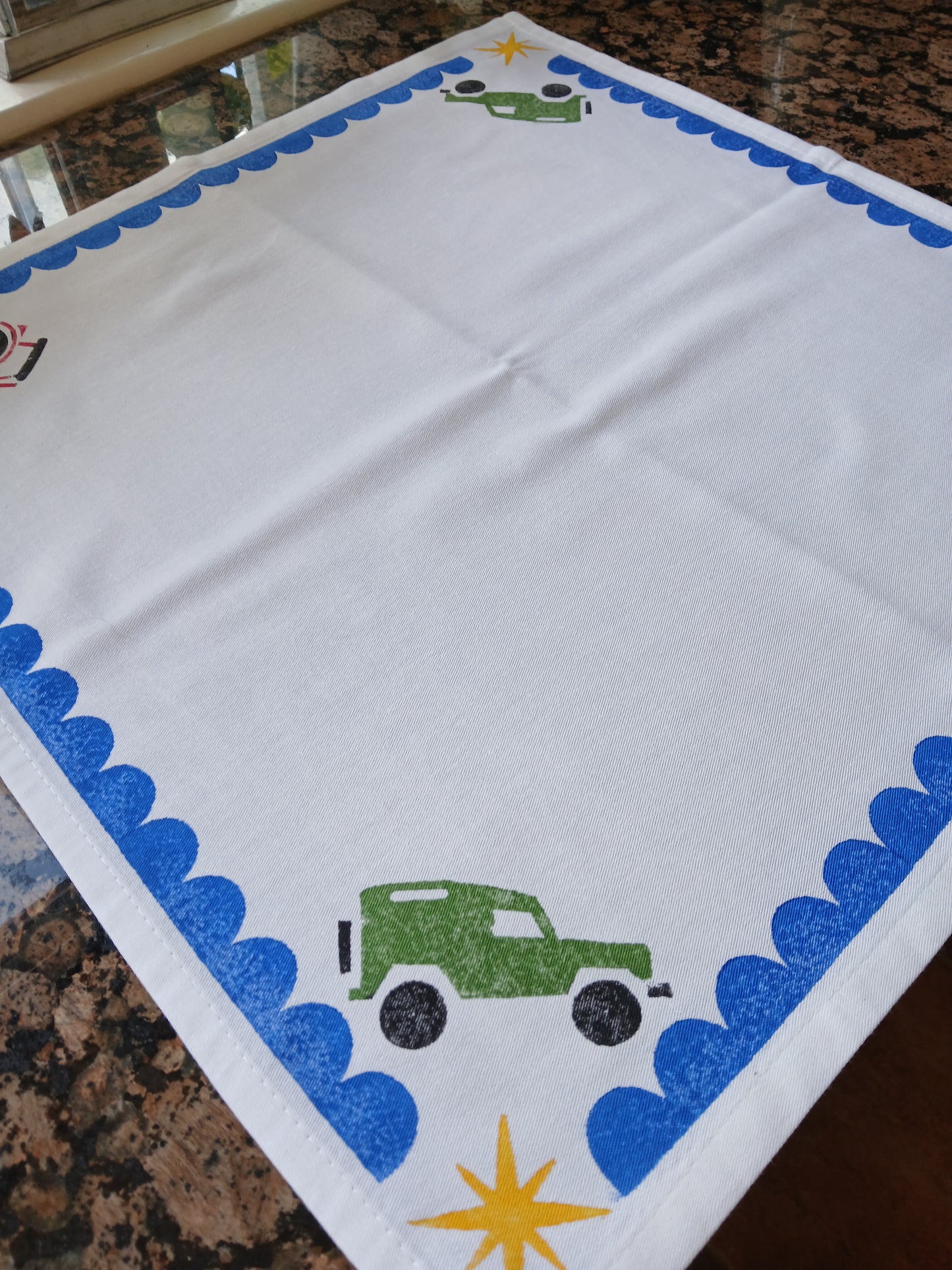 Landrover & Tractors on white cotton napkin