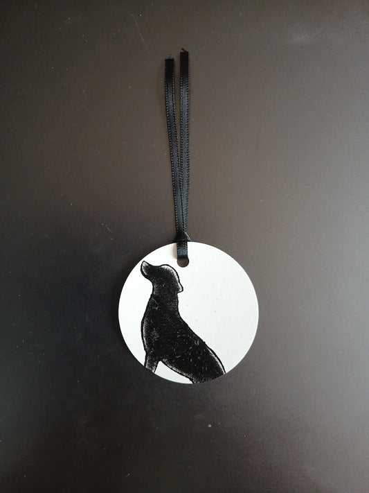 Labrador in Black on round white gift tag with ribbon