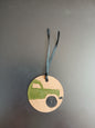 Landrover in Green & Black on round brown gift tag with ribbon