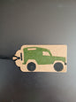 Landrover in Green & Black on oblong brown gift tag with ribbon