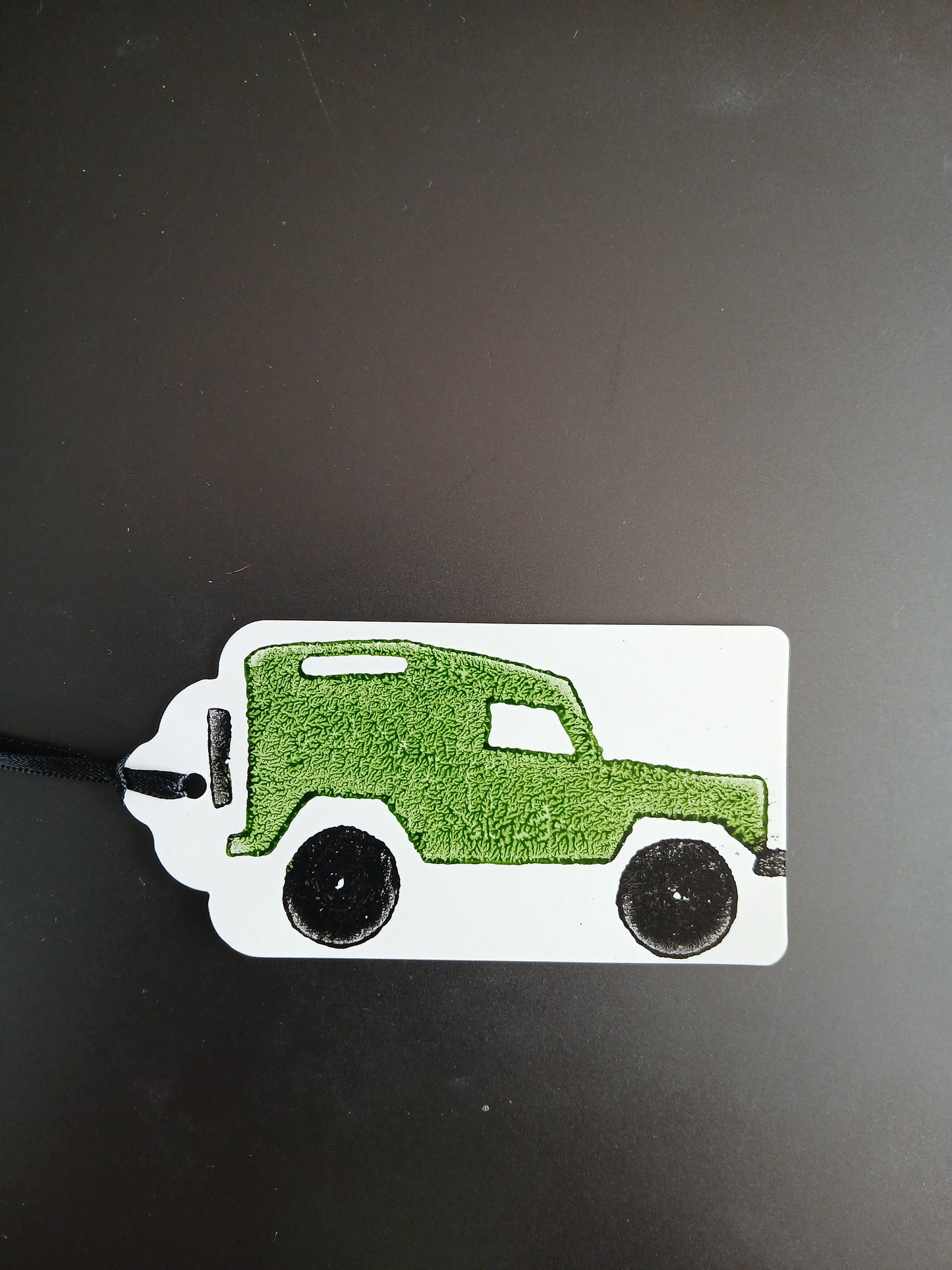 Landrover in Green & Black on oblong white gift tag with ribbon