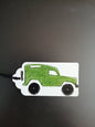 Landrover in Green & Black on oblong white gift tag with ribbon