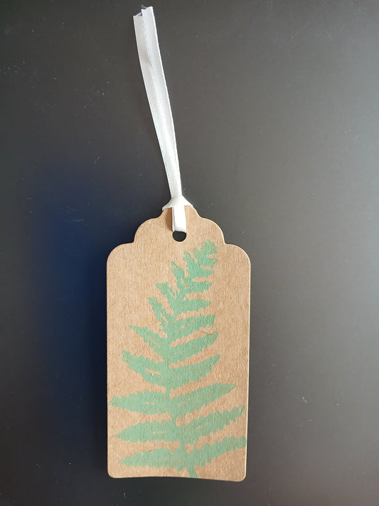 Fern 2 in Mid Green on oblong brown gift tag with ribbon