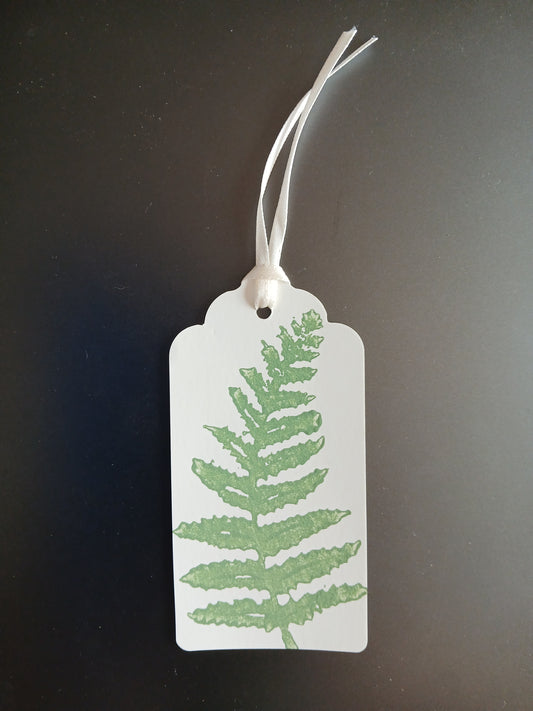 Fern 2 in Mid Green on oblong white gift tag with ribbon