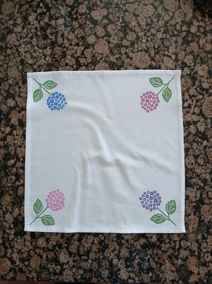 Hydrangeas on white cotton napkin