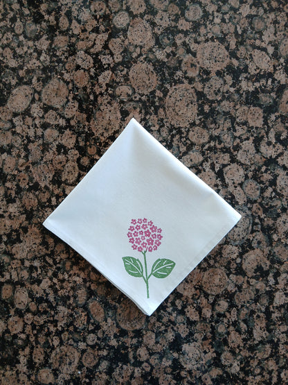 Hydrangeas on white cotton napkin