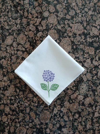 Hydrangeas on white cotton napkin