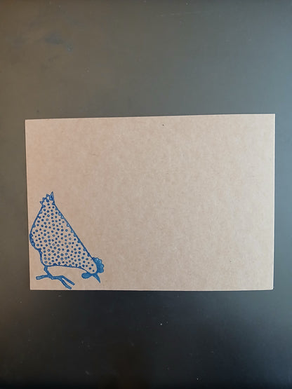 Chicken - Small Spotty with head down - in Navy on brown notelet