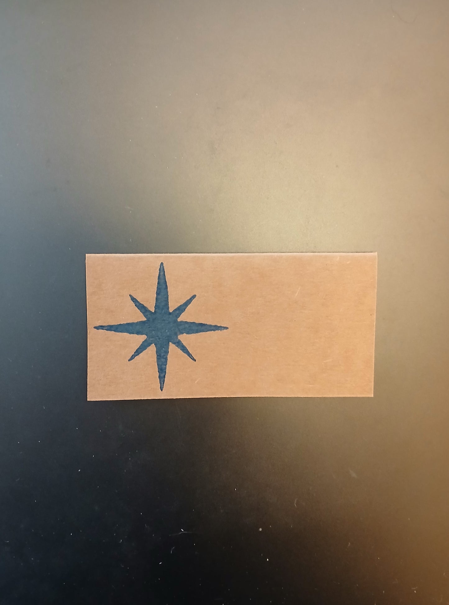 Star on rectangle brown place card (suitable for Christmas)