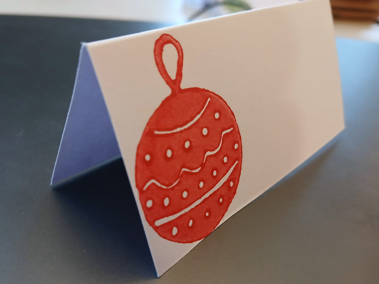 Christmas Bauble in red on rectangle white place card