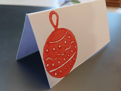 Christmas Bauble in red on rectangle white place card