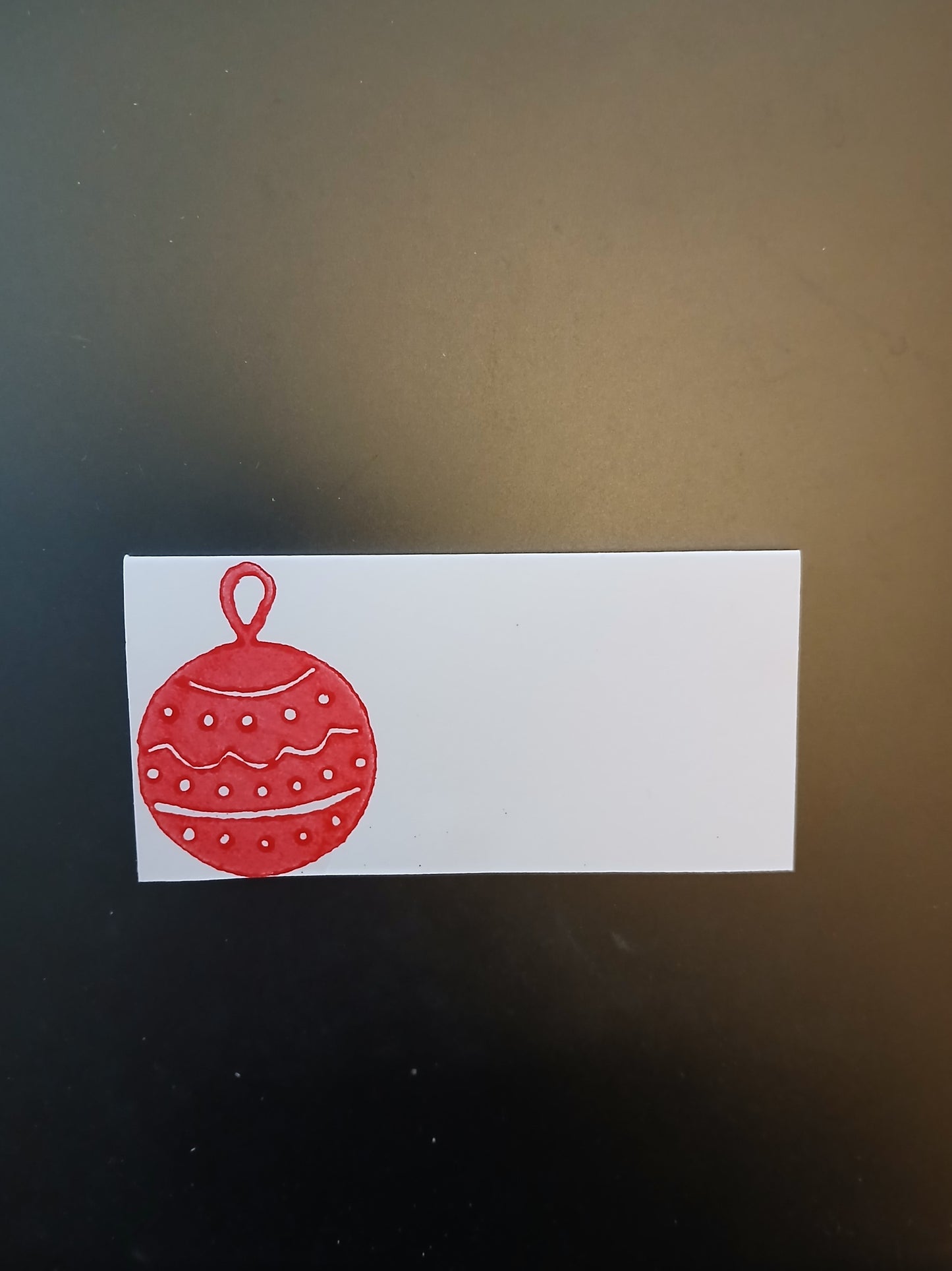 Christmas Bauble in red on rectangle white place card